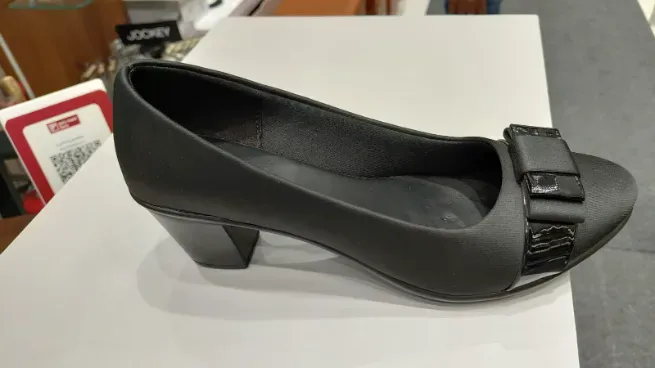  - CAPITAL SHOES