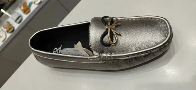  - CAPITAL SHOES