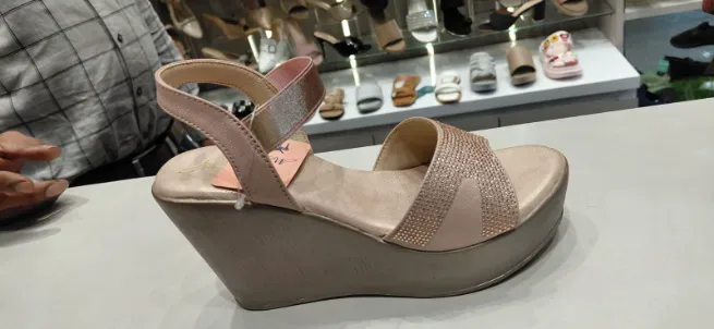  - CAPITAL SHOES