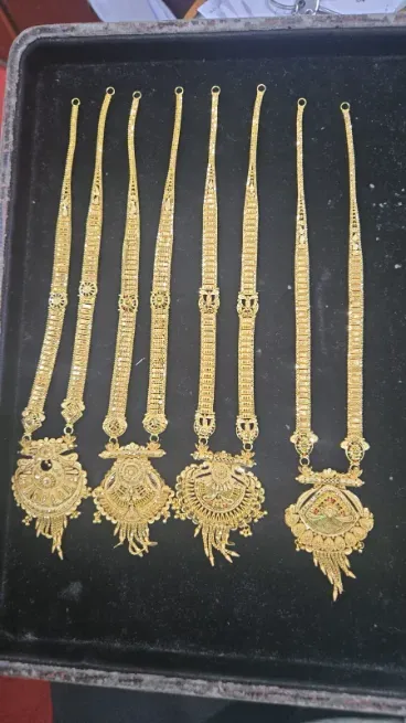  - RADHIKA JEWELLERS