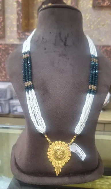  - NAVDURGA JEWELLERS & GALAI