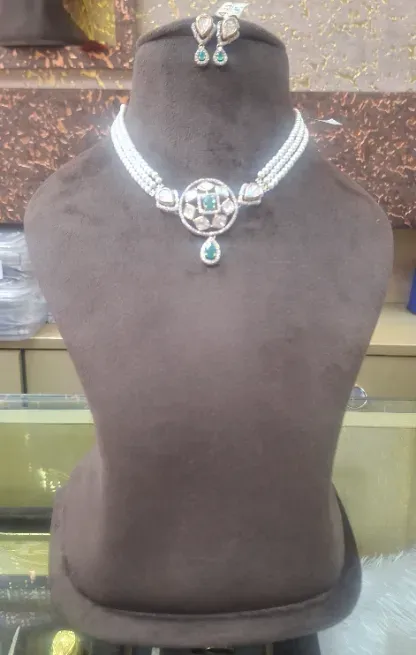  - NAVDURGA JEWELLERS & GALAI
