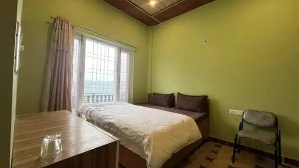 ROOMS  - HOTEL MAA BHAGWATI SWEETS & RESTAURANT